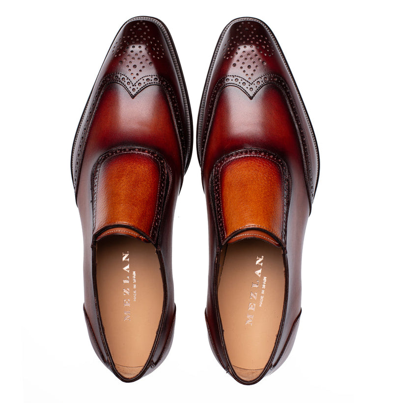 Liberty Wing Tip Medallion Slip | Mezlan